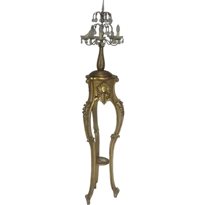 Lamp stand trestle in gilded carved wood . Lombardy 800