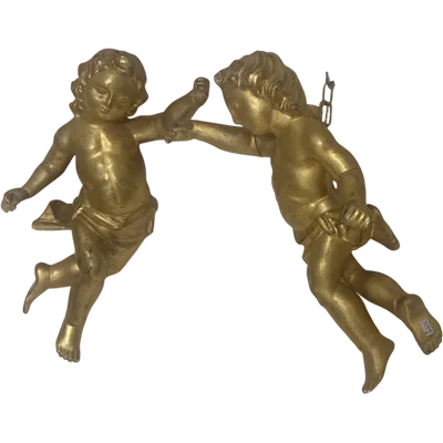Pair of wooden angels in gilded wood . Lombardy early 1700s