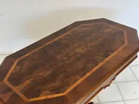 Walnut and briarwood cookie table . Lombardy mid-nineteenth century. Restored