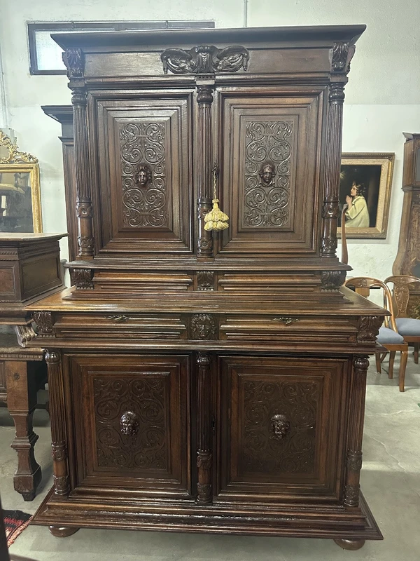 Carved walnut double-body cabinet . 18th century