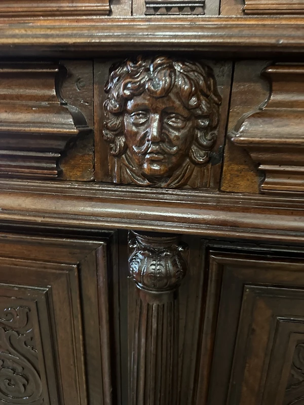 Carved walnut double-body cabinet . 18th century