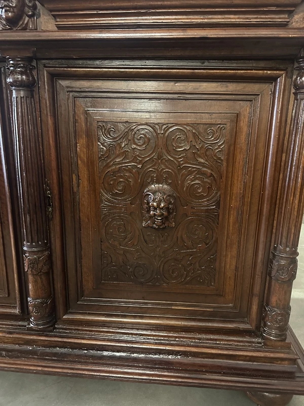 Carved walnut double-body cabinet . 18th century