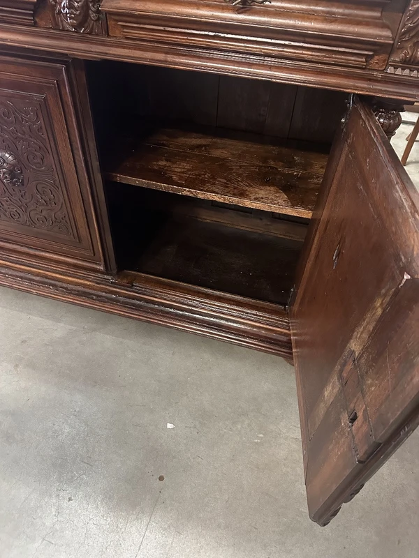 Carved walnut double-body cabinet . 18th century