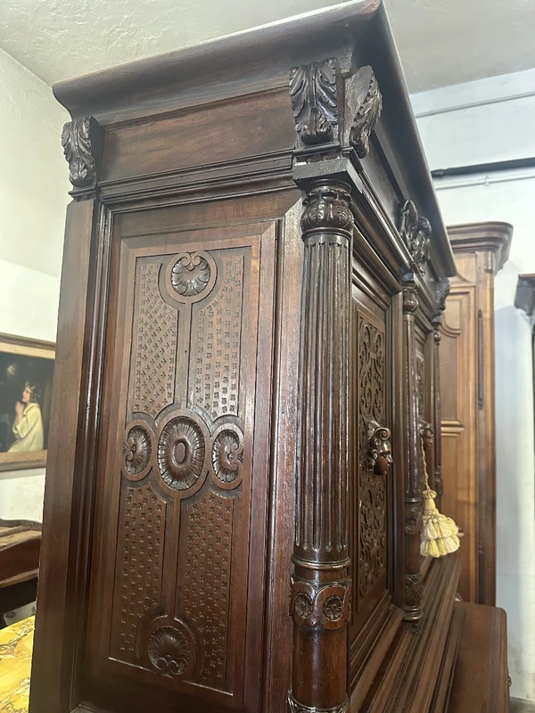 Carved walnut double-body cabinet . 18th century