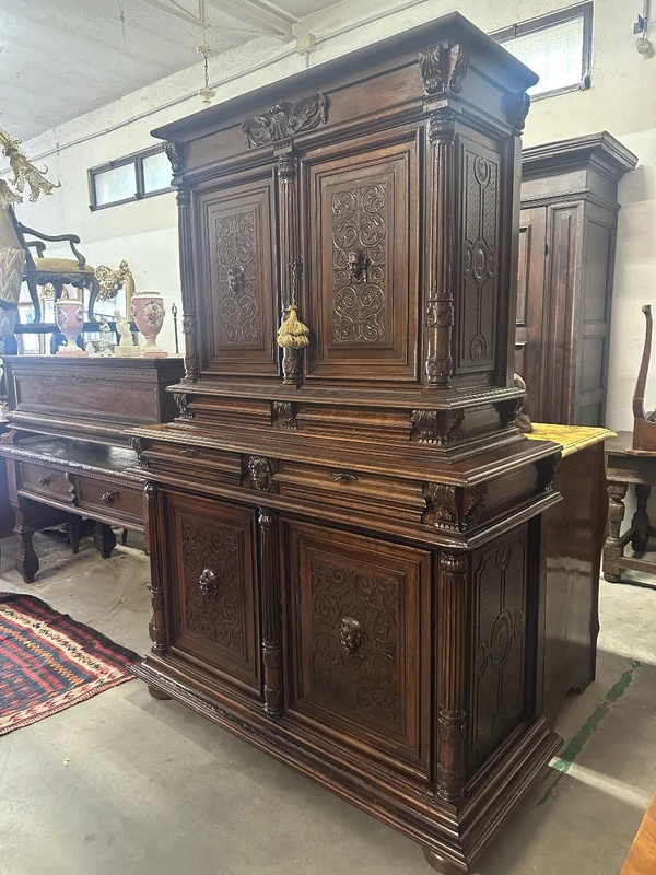 Carved walnut double-body cabinet . 18th century
