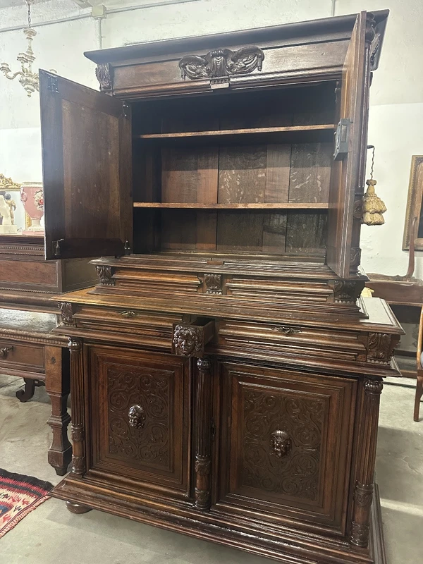 Carved walnut double-body cabinet . 18th century