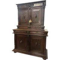 Carved walnut double-body cabinet . 18th century