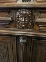 Carved walnut double-body cabinet . 18th century