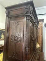 Carved walnut double-body cabinet . 18th century