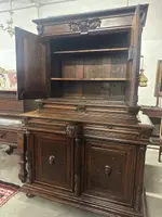Carved walnut double-body cabinet . 18th century
