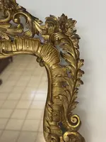 Specchiera con cornice in legno intagliato e dorato. Lombardia XVIII secolo