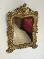 Specchiera con cornice in legno intagliato e dorato. Lombardia XVIII secolo