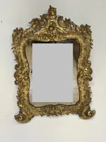 Specchiera con cornice in legno intagliato e dorato. Lombardia XVIII secolo
