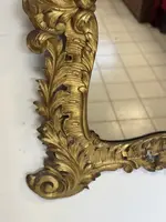 Specchiera con cornice in legno intagliato e dorato. Lombardia XVIII secolo
