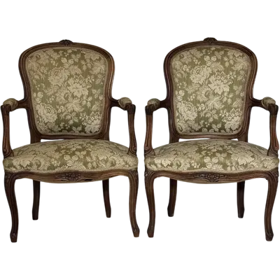 Pair of Louis Philippe armchairs in walnut. 19th century