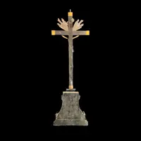 Crocifisso in bronzo con modanature in argento e croce con base in ebano.