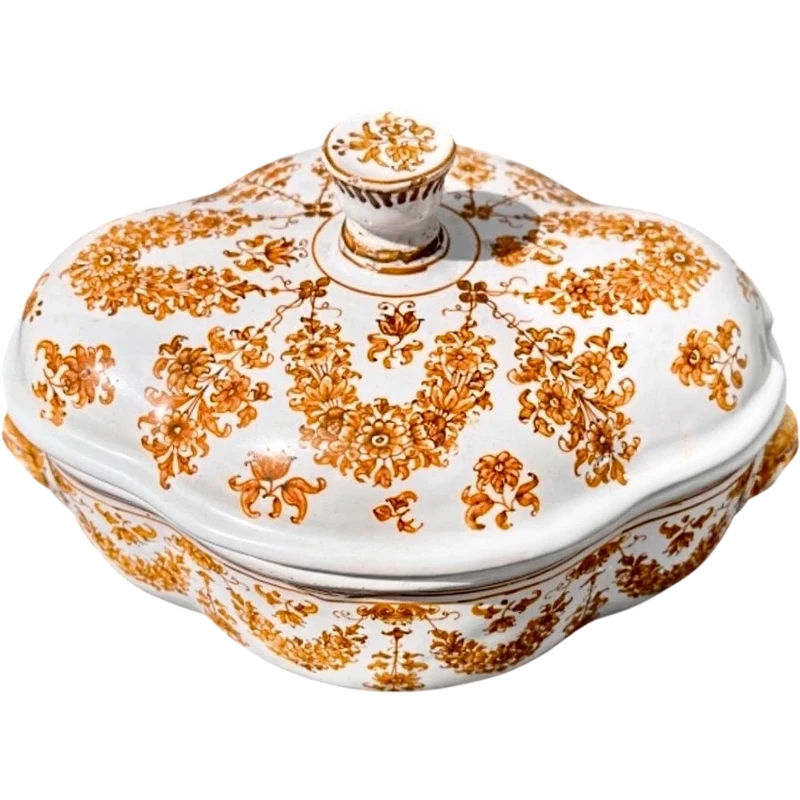Majolica soup tureen. Decorated with floral motifs and festoons with masked sockets.Moustiers