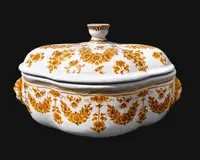 Majolica soup tureen. Decorated with floral motifs and festoons with masked sockets.Moustiers