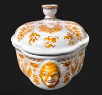 Majolica soup tureen. Decorated with floral motifs and festoons with masked sockets.Moustiers