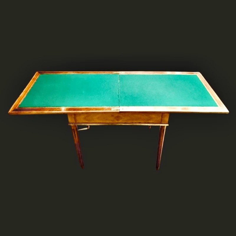 Walnut game table with inlays. The top is sliding and tilting