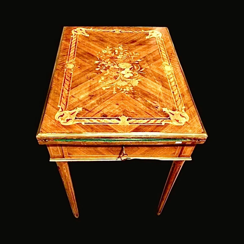 Walnut game table with inlays. The top is sliding and tilting