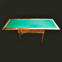 Walnut game table with inlays. The top is sliding and tilting