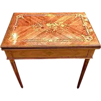 Walnut game table with inlays. The top is sliding and tilting