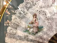Tempera painting on cardboard depicting a fan with gallant scenes