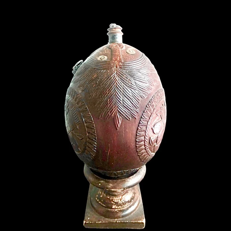 Engraved coconut powder box.