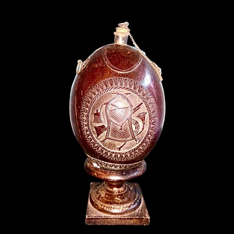 Engraved coconut powder box.