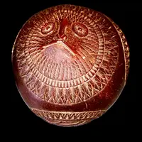 Engraved coconut powder box.