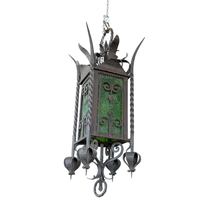 Suspended lantern made of wrought iron and green blown glass