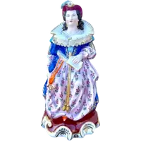 Veilleuse figurée avec figure de dame assise.France