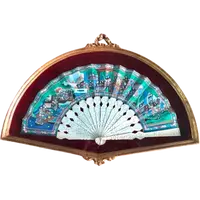 Fan with perforated slats and painted paper peacock.