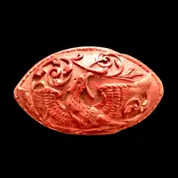 Tabatière une graine de curozo avec une scène de personnage gravée.