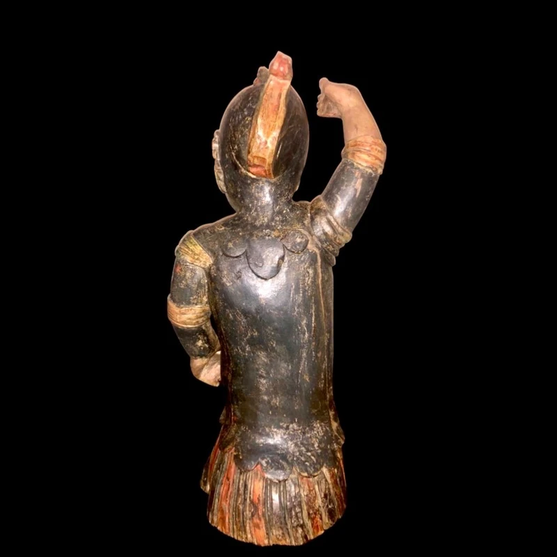 Polychrome wooden sculpture depicting soldier.