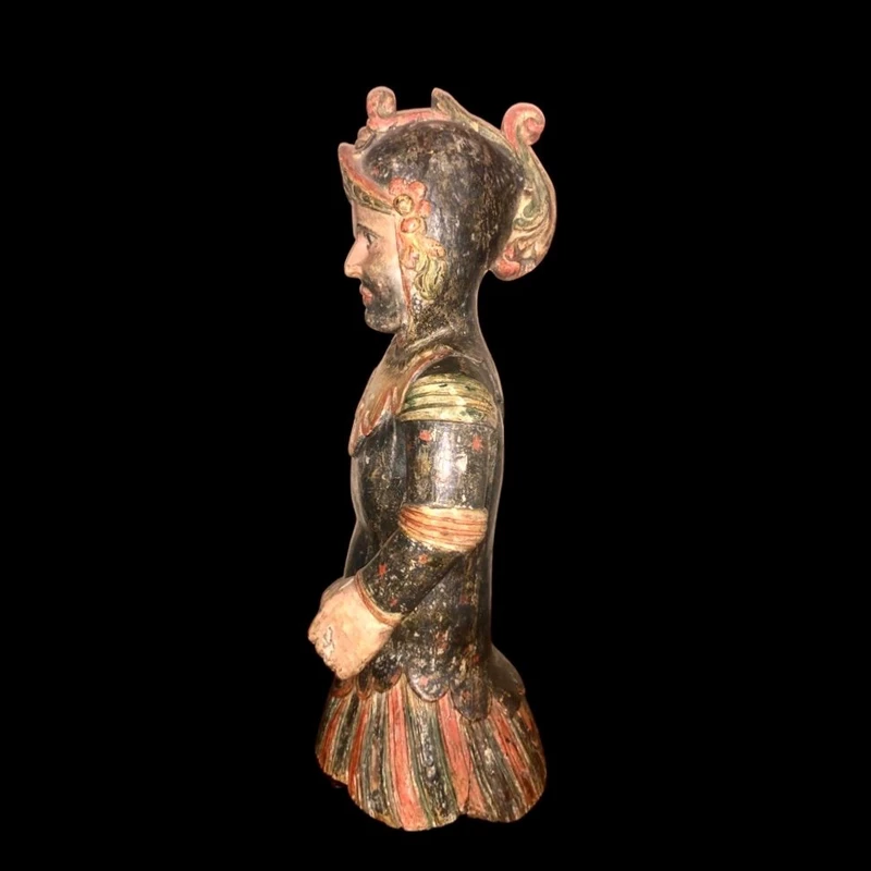 Polychrome wooden sculpture depicting soldier.