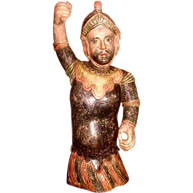 Polychrome wooden sculpture depicting soldier.