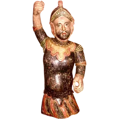 Polychrome wooden sculpture depicting soldier.