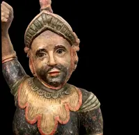 Polychrome wooden sculpture depicting soldier.