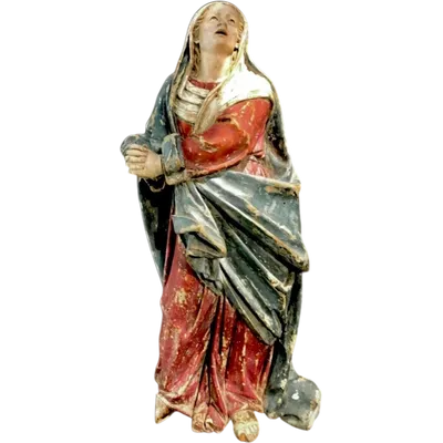 Polychrome wooden sculpture with glass eyes depicting Our Lady of Sorrows.