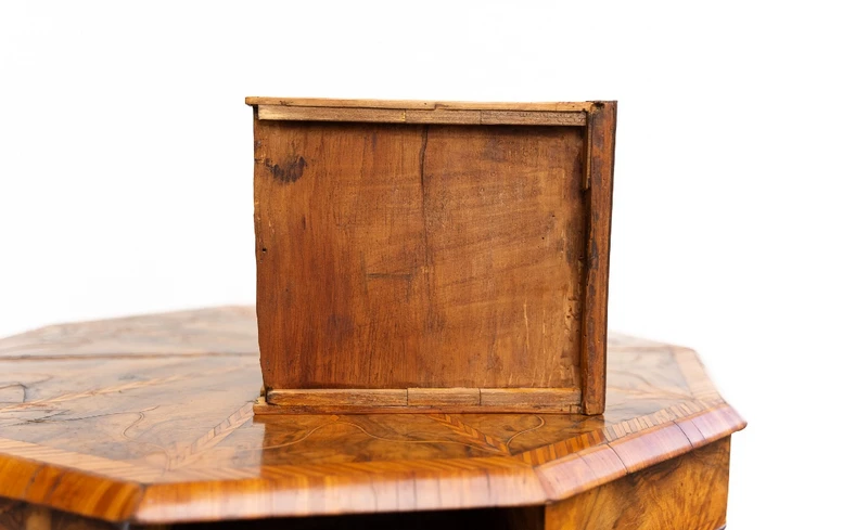 Walnut and maple octagonal coffee table from the 1800s