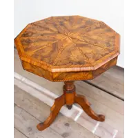 Walnut and maple octagonal coffee table from the 1800s