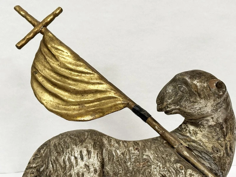 Silver-plated and gilded carved wooden sculpture raff.te Agnus Dei