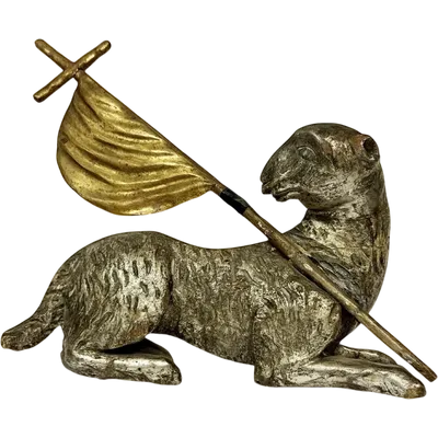 Silver-plated and gilded carved wooden sculpture raff.te Agnus Dei