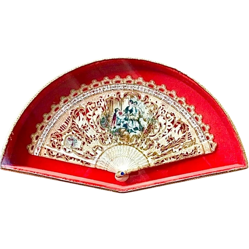 Fan with pierced bone slats with gold highlights and painted gallant scene.France