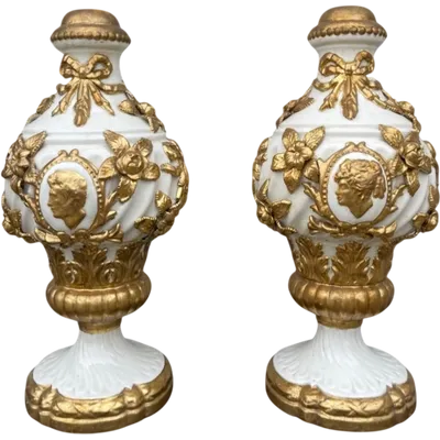 Pair of large majolica lamps with cold gilded relief parts