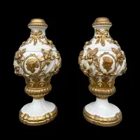 Pair of large majolica lamps with cold gilded relief parts