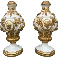 Pair of large majolica lamps with cold gilded relief parts
