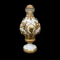 Pair of large majolica lamps with cold gilded relief parts